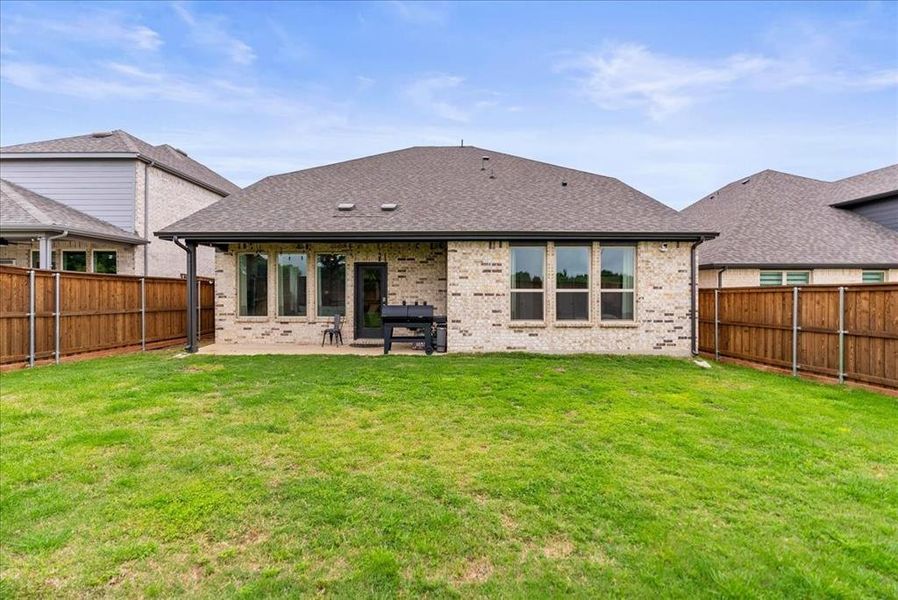 Exterior details and patio area of a home in , Little Elm (Image 3).