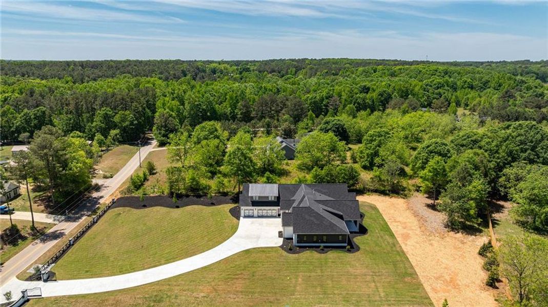 Front exterior of a new home in , Monroe, GA, highlighting curb appeal (Image 43).