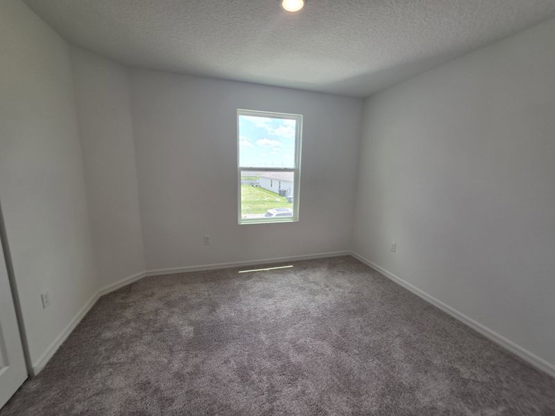 Spacious, unfurnished interior of a new home in Lake Deer Estates, Poinciana (Image 8). Spacious, unfurnished interior of a new home in Lake Deer Estates, Poinciana (Image 8).