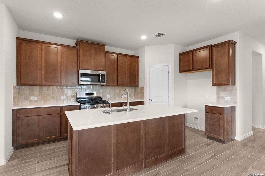 Furnished interior view inside a new home in Meyer Ranch - Enclave, New Braunfels (Image 6).