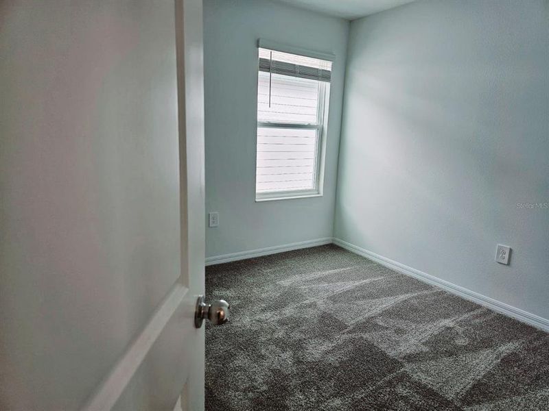 Spacious, unfurnished interior of a new home in Peace Creek Reserve, Winter Haven (Image 18).