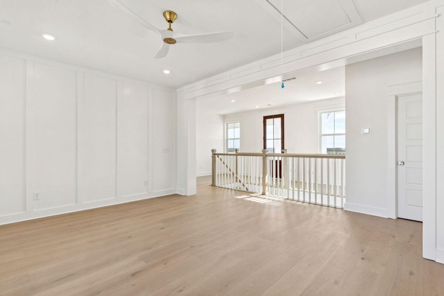 Spacious, unfurnished interior of a new home in Overlook at Copahee Sound, Awendaw (Image 51).