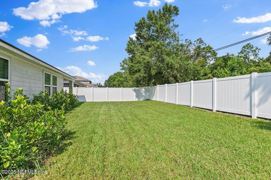 Front exterior of a new home in Wells Landing, Jacksonville, FL, highlighting curb appeal (Image 2). Front exterior of a new home in Wells Landing, Jacksonville, FL, highlighting curb appeal (Image 2).