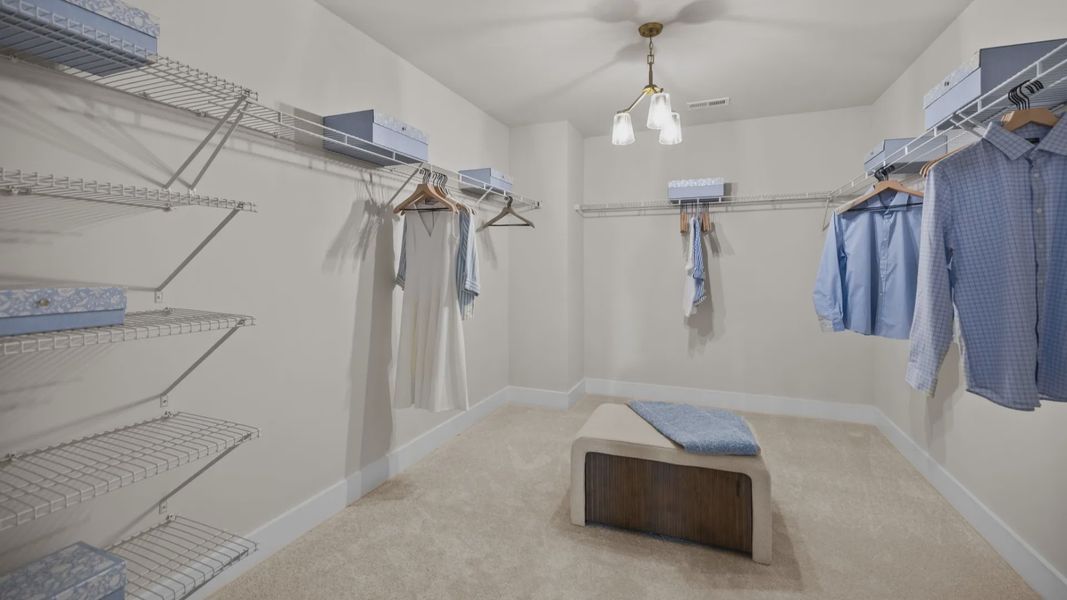 The Stonefield Plan by DRB Homes in McBride Indian Trail, NC - Primary Walk in Closet The Stonefield Plan by DRB Homes in McBride Indian Trail, NC - Primary Walk in Closet