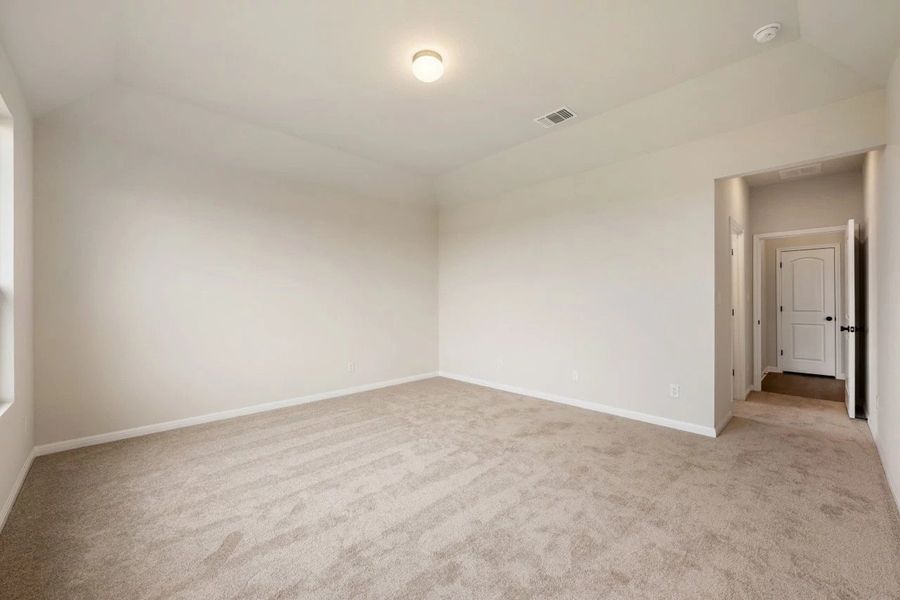 Spacious, unfurnished interior of a new home in The Colony 50s, Bastrop (Image 41).