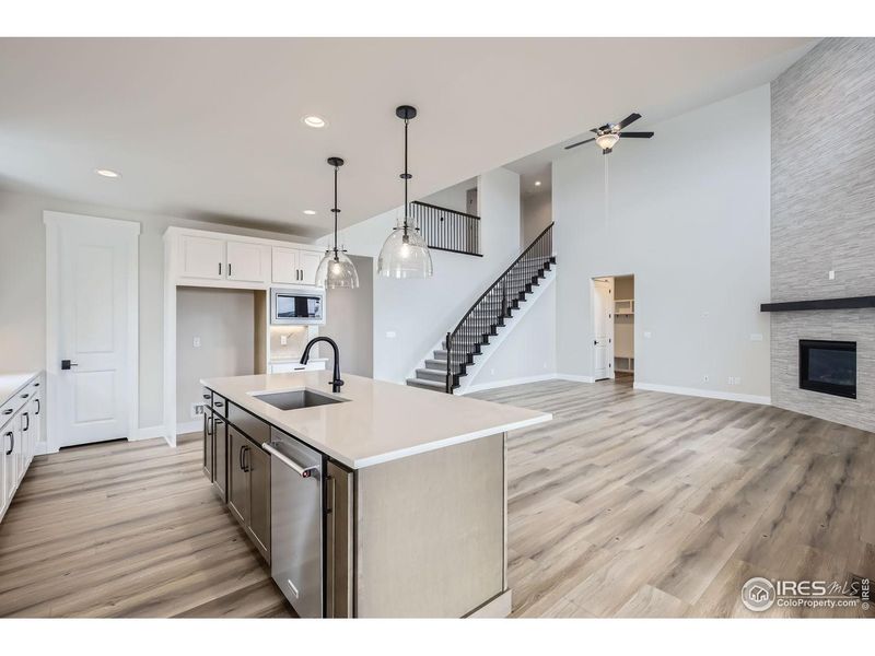 Furnished interior view inside a new home in RainDance, Windsor (Image 7).