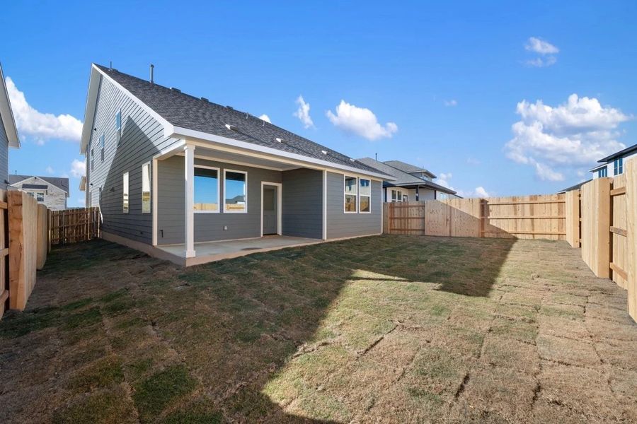Exterior details and patio area of a home in Lariat, Liberty Hill (Image 4). Exterior details and patio area of a home in Lariat, Liberty Hill (Image 4).