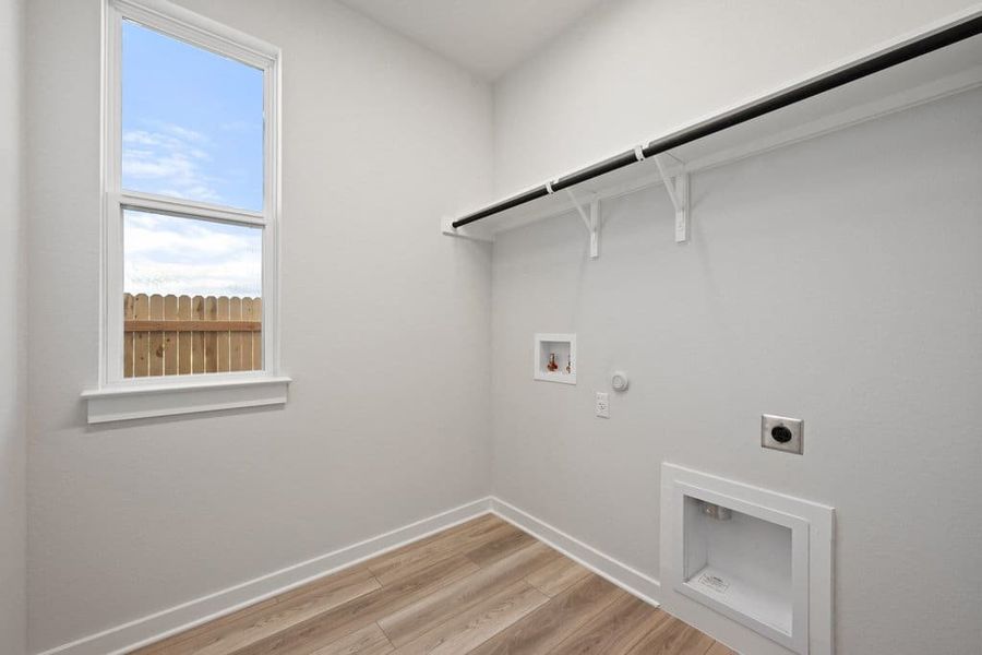 Spacious, unfurnished interior of a new home in Terrace Collection At Turner's Crossing, Buda (Image 36).