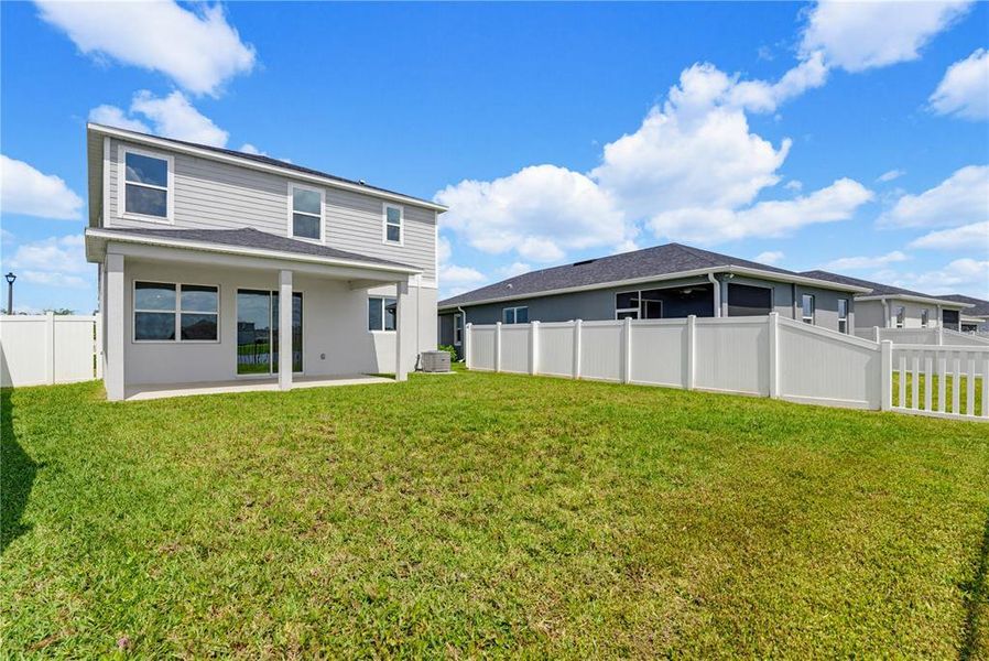 Exterior details and patio area of a home in , Parrish (Image 4).