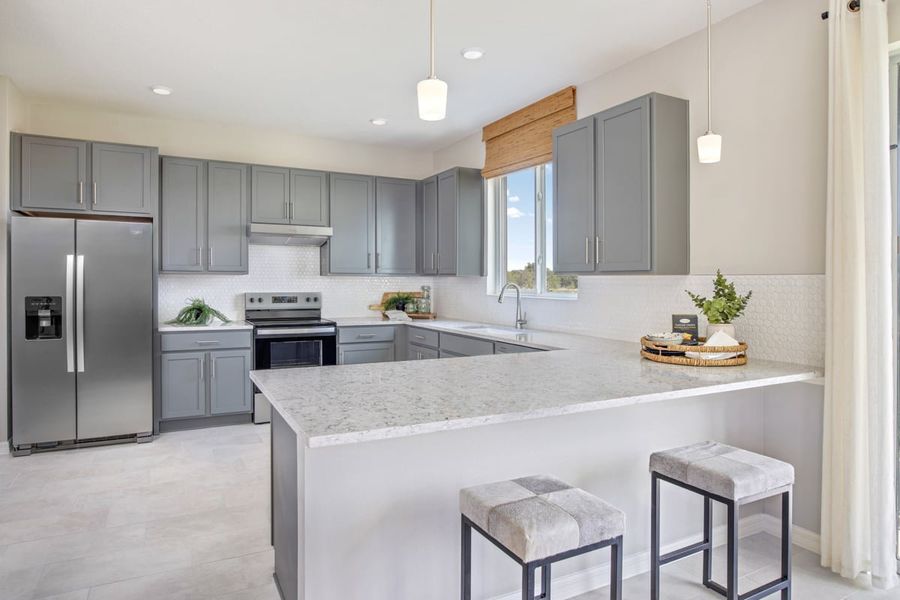 Furnished interior in a model home at Cedar Crossings I in Haines City (Image 5).