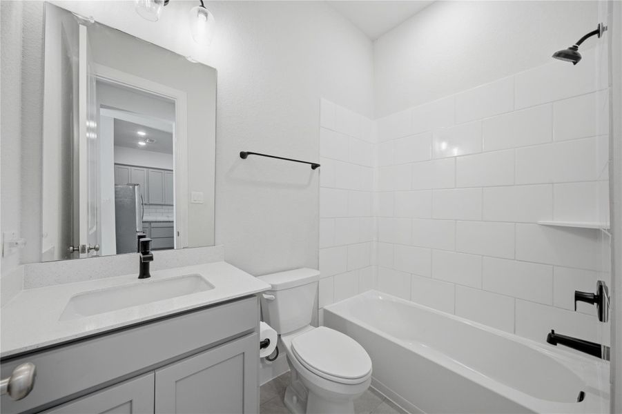 Furnished interior view inside a new home in The Groves 35', Humble (Image 6).