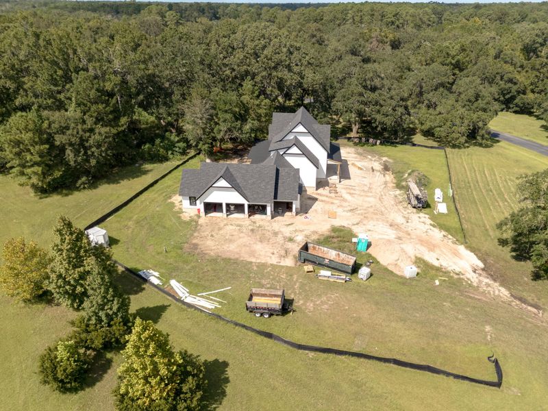 Front exterior of a new home in , Wadmalaw Island, SC, highlighting curb appeal (Image 9). Front exterior of a new home in , Wadmalaw Island, SC, highlighting curb appeal (Image 9).