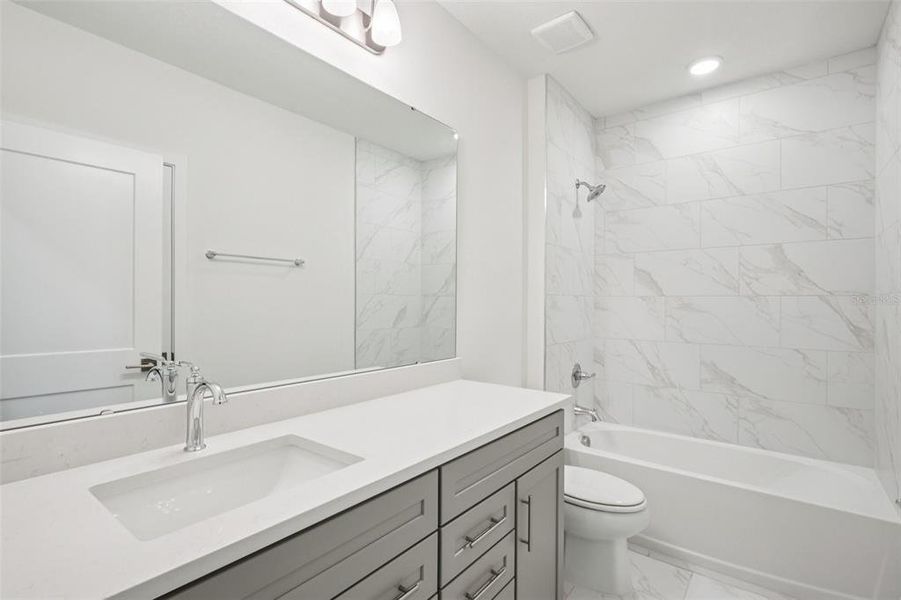 Furnished interior view inside a new home in Grasslands West, Lakeland (Image 11).