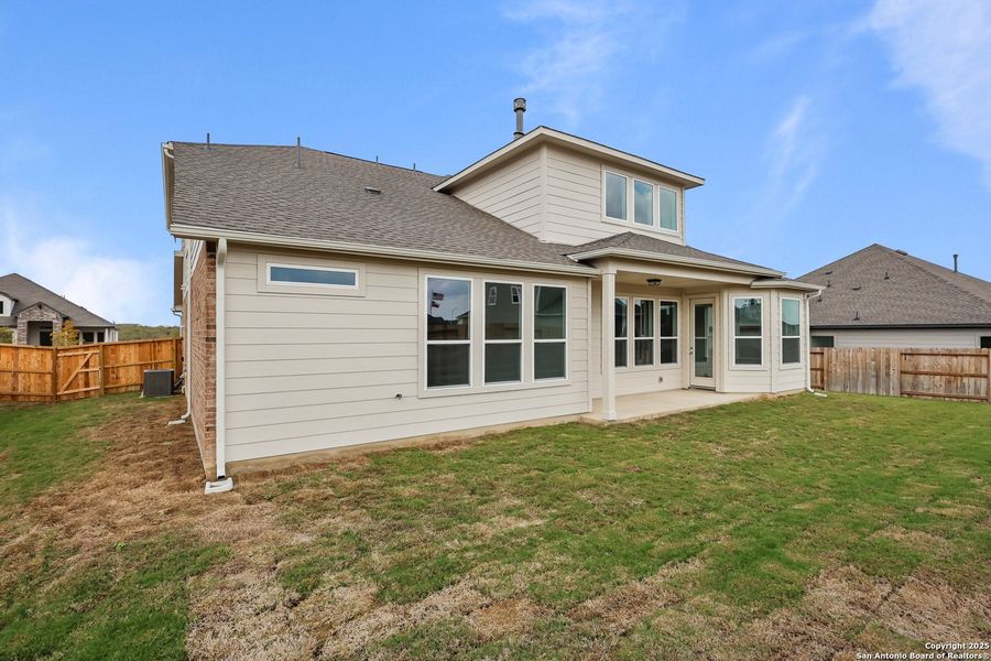 Exterior details and patio area of a home in Homestead 75', Schertz (Image 23).
