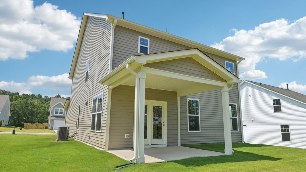 Front exterior of a new home in The Farm at Neill's Creek, Lillington, NC, highlighting curb appeal (Image 22).