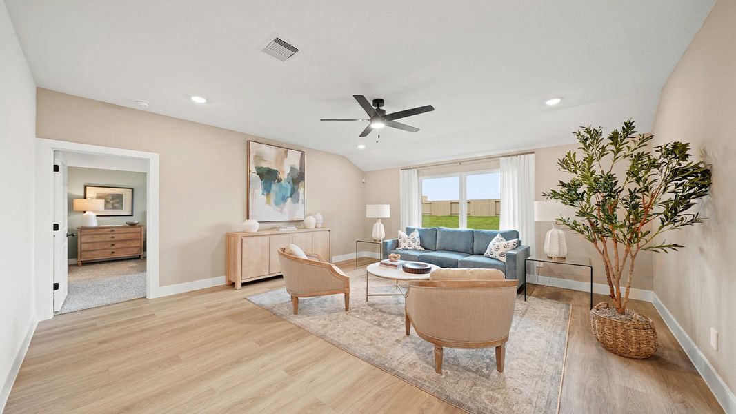 Representative furnished interior of a home built from the Texas Cali by D.R. Horton in Chapel Lakes, Montgomery (Image 12).