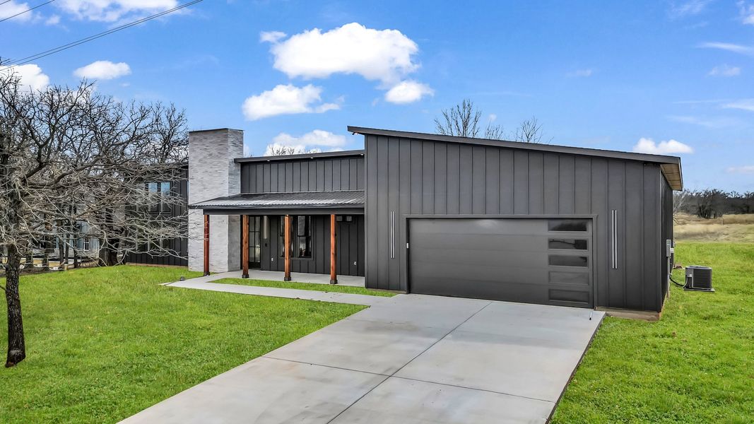 Representative exterior photo of a completed home built from the Zephyer 2 by Zeal Home Builders in Parallel Pastures, Poolville, TX (Image 2).