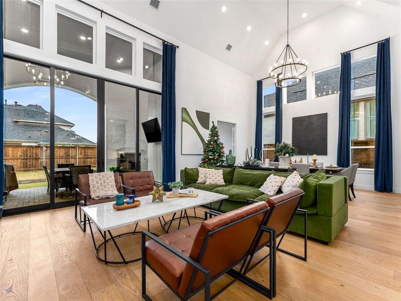 The oversized sliding doors lead to the covered back patio.