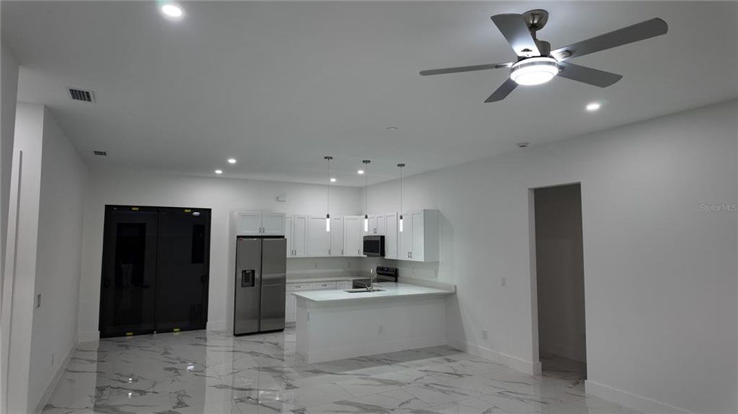 Furnished interior view inside a new home in , Port Charlotte (Image 4).