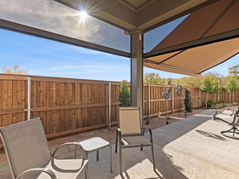 Side Yard Patio with Remote Controlled Screens and Awning