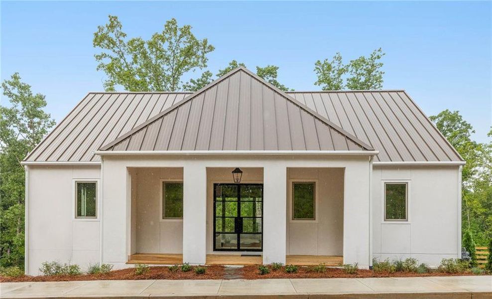 Front exterior of a new home in , Chattahoochee Hills, GA, highlighting curb appeal (Image 23).