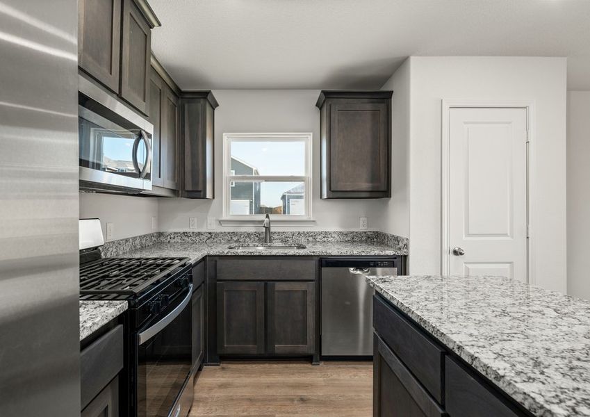 The kitchen of the Sabine has beautiful wood cabinetry. The kitchen of the Sabine has beautiful wood cabinetry.