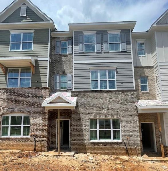 In-progress construction of a new home in Townes at South Main, Kennesaw, GA (Image 25).