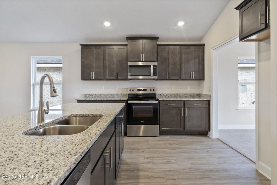 Furnished interior view inside a new home in Shadow Crest at Rolling Hills, Green Cove Springs (Image 7). Furnished interior view inside a new home in Shadow Crest at Rolling Hills, Green Cove Springs (Image 7).