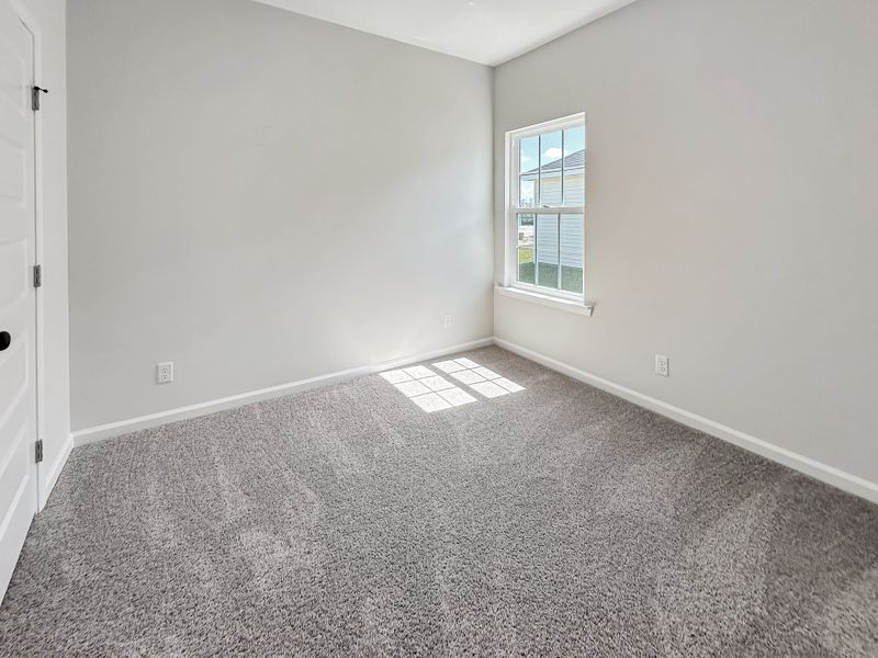Spacious, unfurnished interior of a new home in Grand Reserve, Ludowici (Image 19).