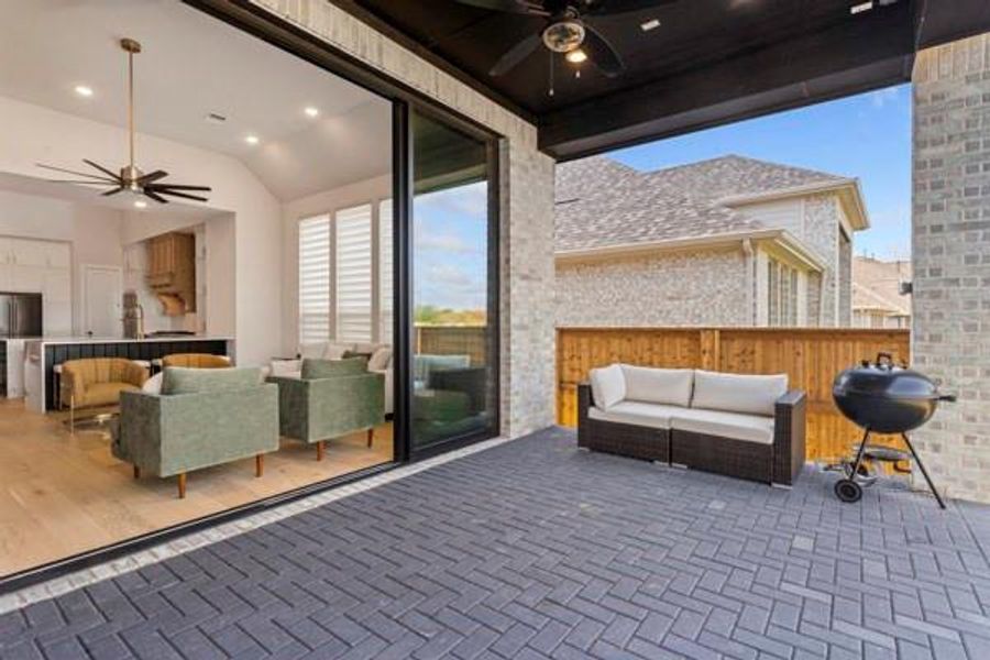 View of patio / terrace with ceiling fan, outdoor lounge area, and a grill