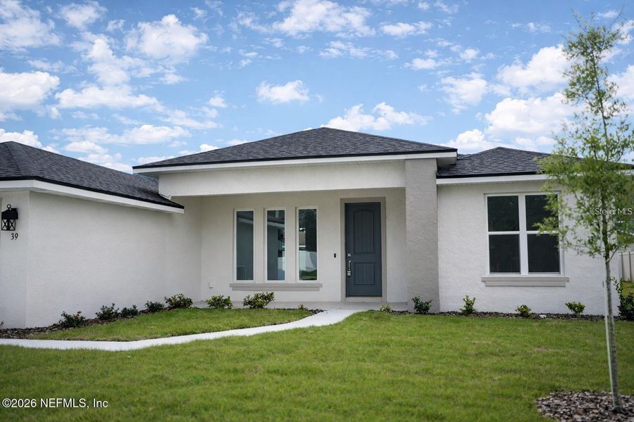 Exterior details and patio area of a home in , Palm Coast (Image 2). Exterior details and patio area of a home in , Palm Coast (Image 2).