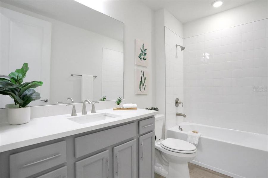 Furnished interior view inside a new home in Bungalow Walk at Lakewood Ranch, Sarasota (Image 11).