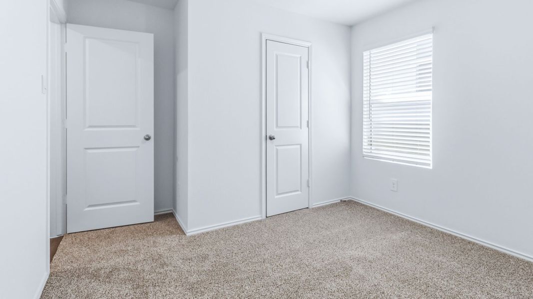 Representative unfurnished interior of a home built from the The Easton by D.R. Horton in Wayside, Uhland (Image 24).