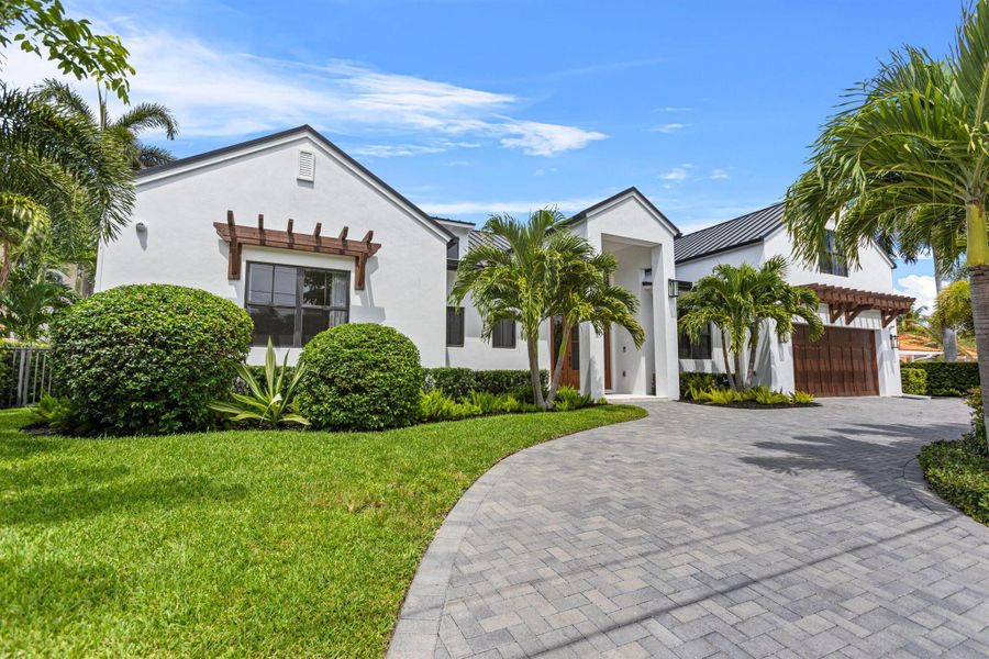 Front exterior of a new home in , Riviera Beach, FL, highlighting curb appeal (Image 23).
