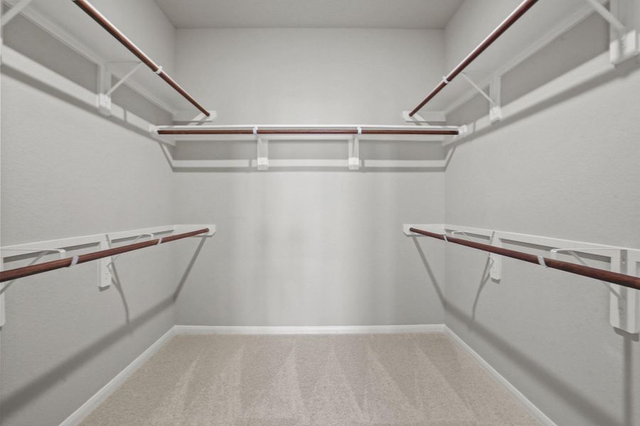 Walk-in closet in owner's suite (*Photo not of actual home and used for illustration purposes only.)