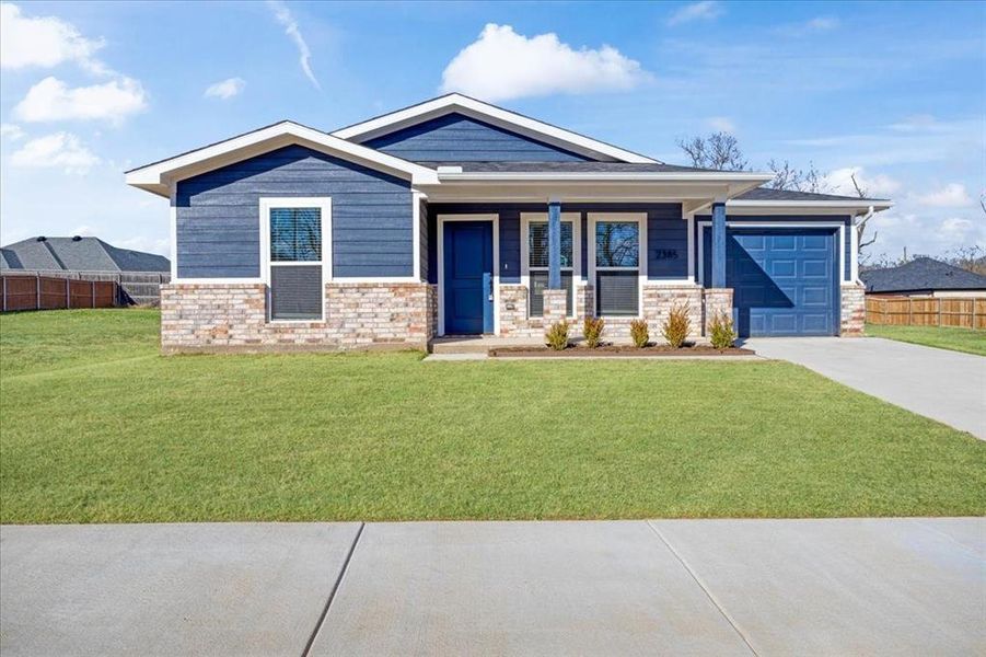 Front exterior of a new home in Miller Street Cottages, Denison, TX, highlighting curb appeal (Image 13).