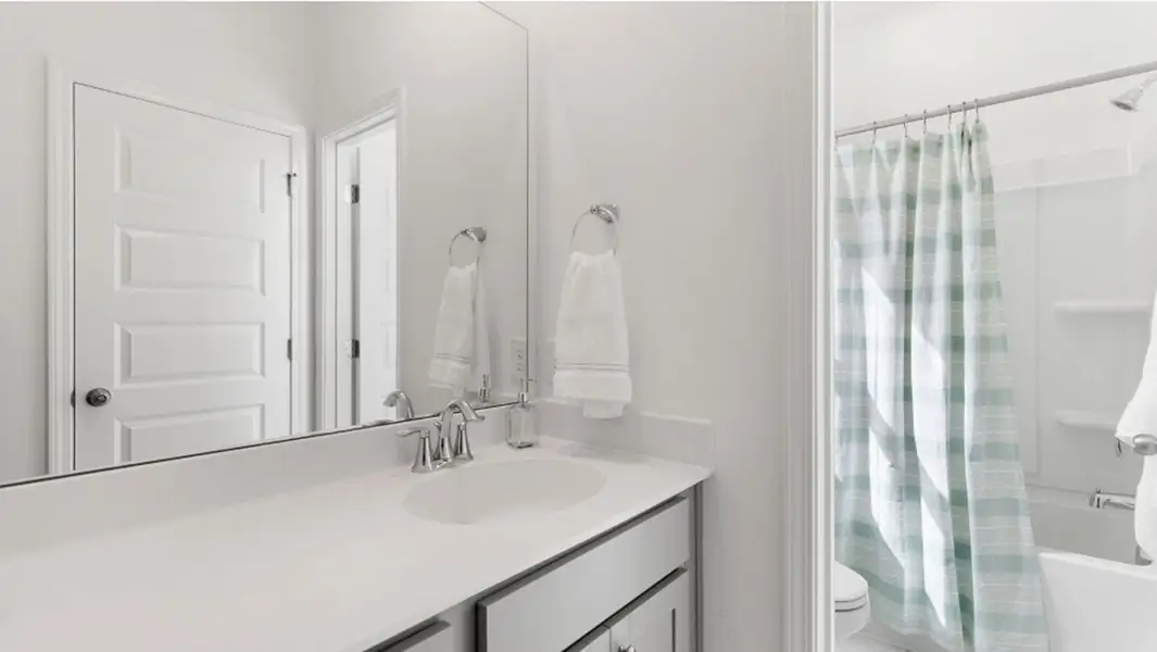 Furnished interior view inside a new home in Heron's Walk at Summers Corner, Summerville (Image 16).