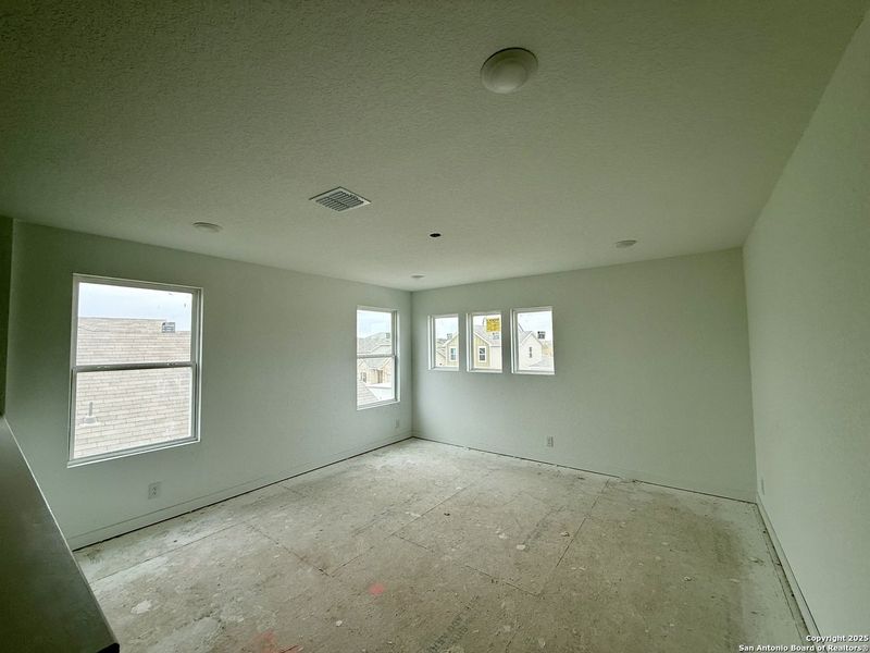 In-progress construction of a new home in The Arbors at the Wilder, Adkins, TX (Image 26).