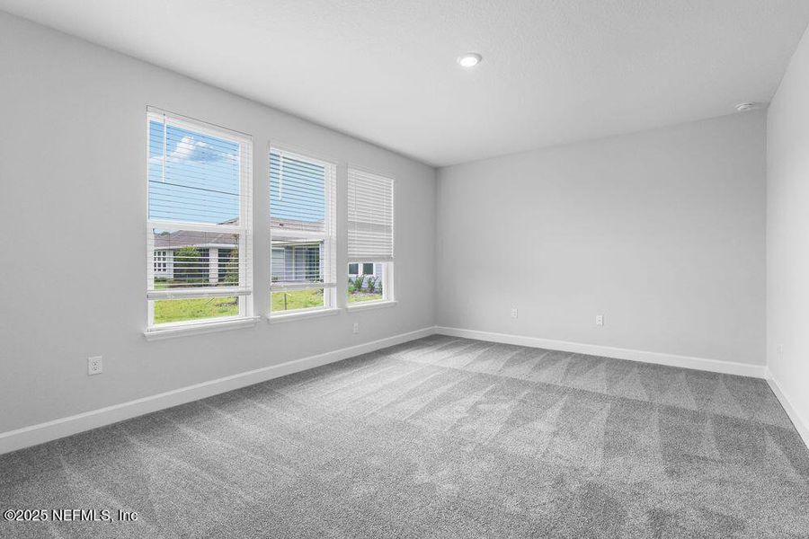 Spacious, unfurnished interior of a new home in Colbert Landings, Palm Coast (Image 21).