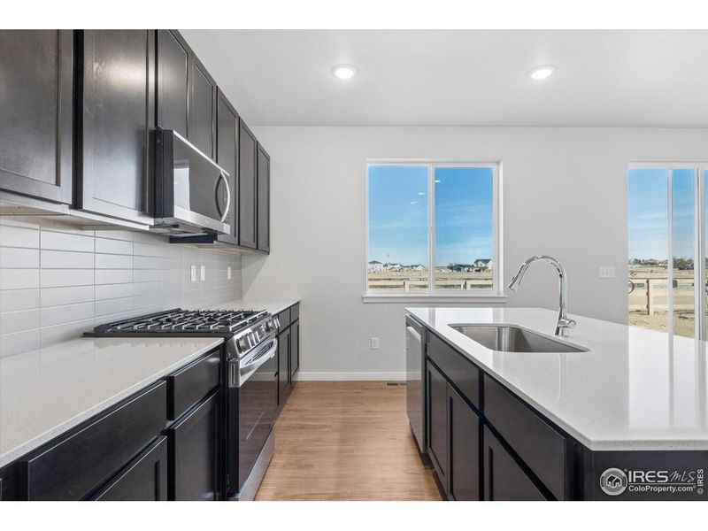 Furnished interior view inside a new home in Prairie Song, Windsor (Image 7).