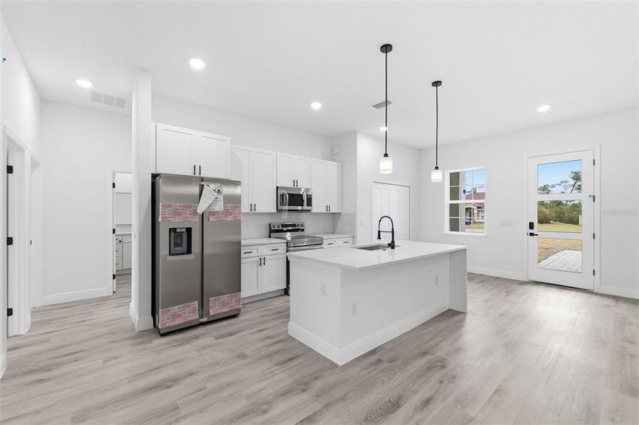 Furnished interior view inside a new home in , Ocala (Image 9).