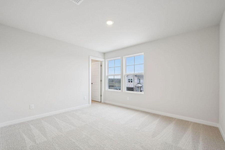 Spacious, unfurnished interior of a new home in The Glen at Stallion Run, Buda (Image 21).