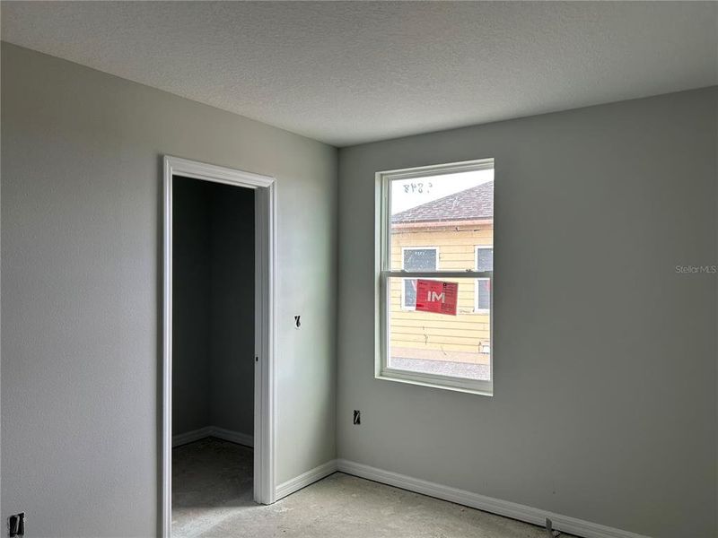 In-progress construction of a new home in Oakfield Trails Signature, Parrish, FL (Image 32).