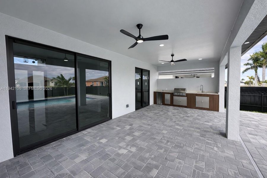 Exterior details and patio area of a home in , Cape Coral (Image 24).
