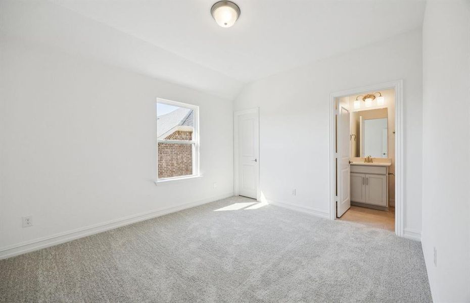 Roomy secondary bedroom with extensive closet storage *Model representation Roomy secondary bedroom with extensive closet storage *Model representation