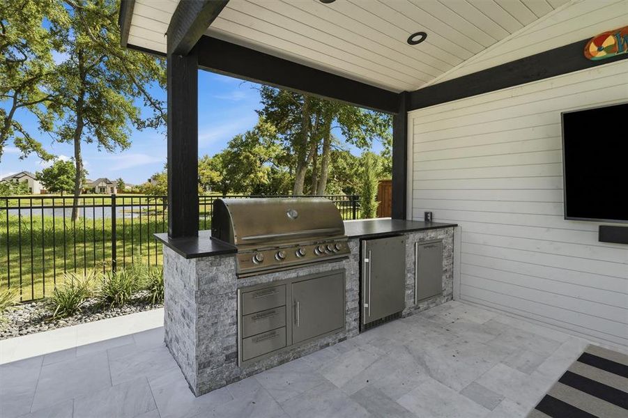 Exterior details and patio area of a home in Trinity Falls: 70ft. lots, McKinney (Image 24).