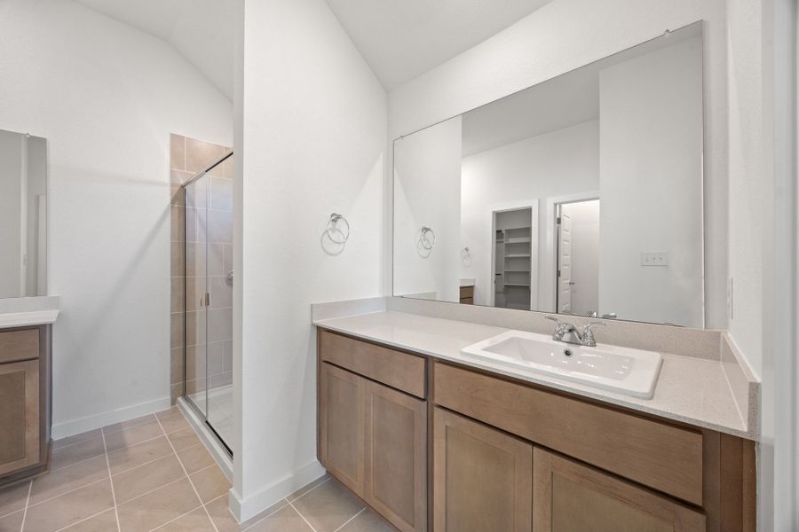 Primary Bathroom in the Turquoise home plan by Trophy Signature Homes – REPRESENTATIVE PHOTO
