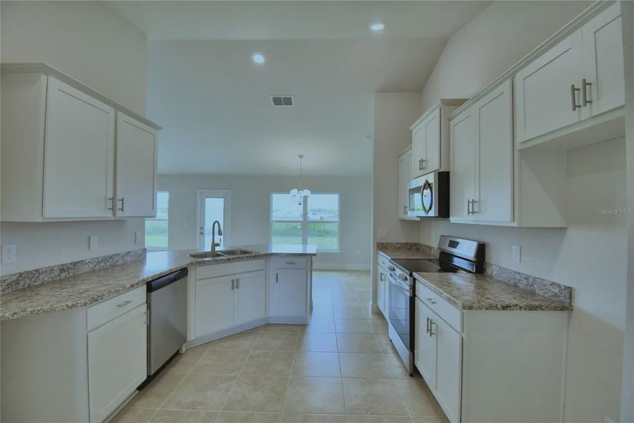 Furnished interior view inside a new home in Cadence Crossing, Auburndale (Image 6).