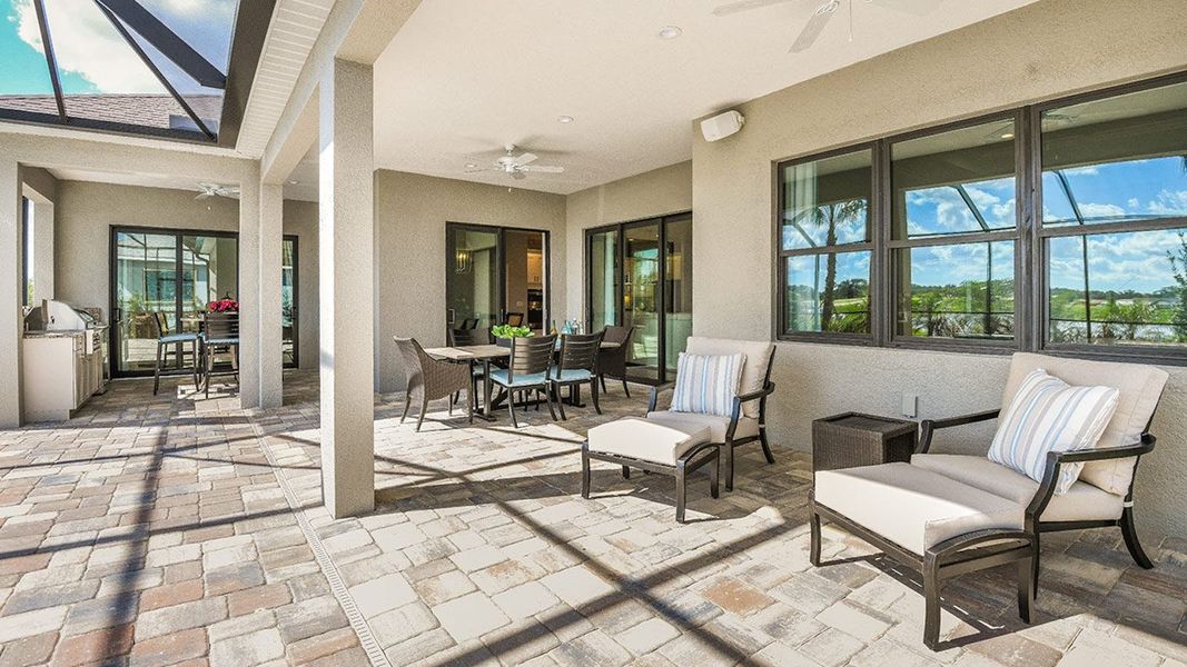 Exterior details and patio area of a home in Canoe Creek Real Estate and Homes for Sale in Parrish, FL - Neal Communities, Parrish (Image 2). Exterior details and patio area of a home in Canoe Creek Real Estate and Homes for Sale in Parrish, FL - Neal Communities, Parrish (Image 2).