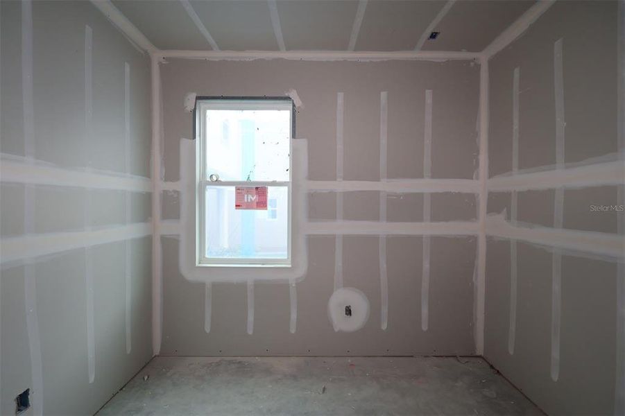 In-progress construction of a new home in Lake Star at Ovation, Winter Garden, FL (Image 7).